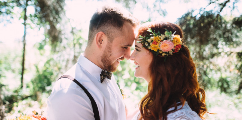 Portrait of a happy newlywed couple. Loving couple looking at each other and laughing